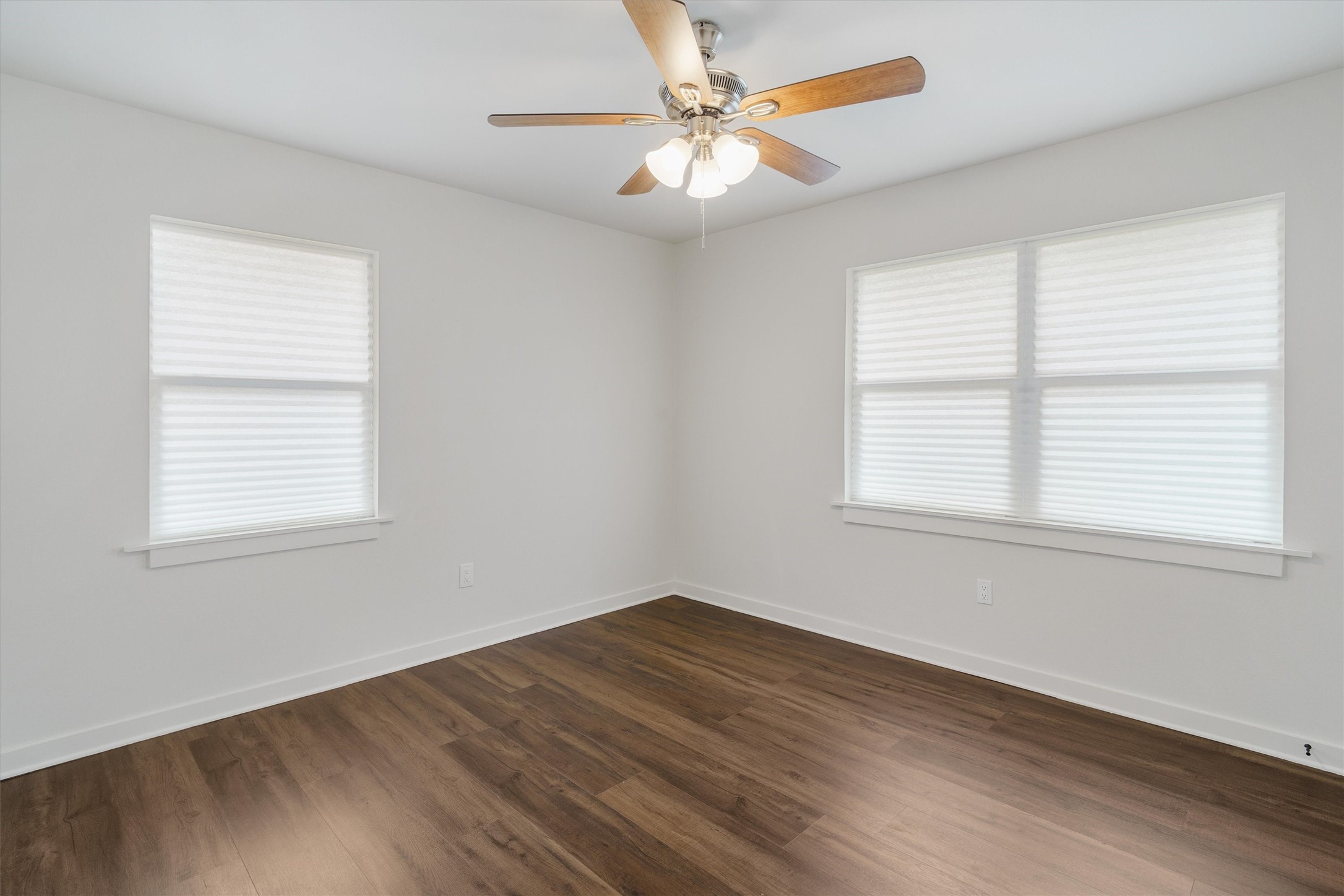 1801 Harding Street Pasadena, TX 77502 - Photo 20 of 22 wooden floor in an empty room with a window