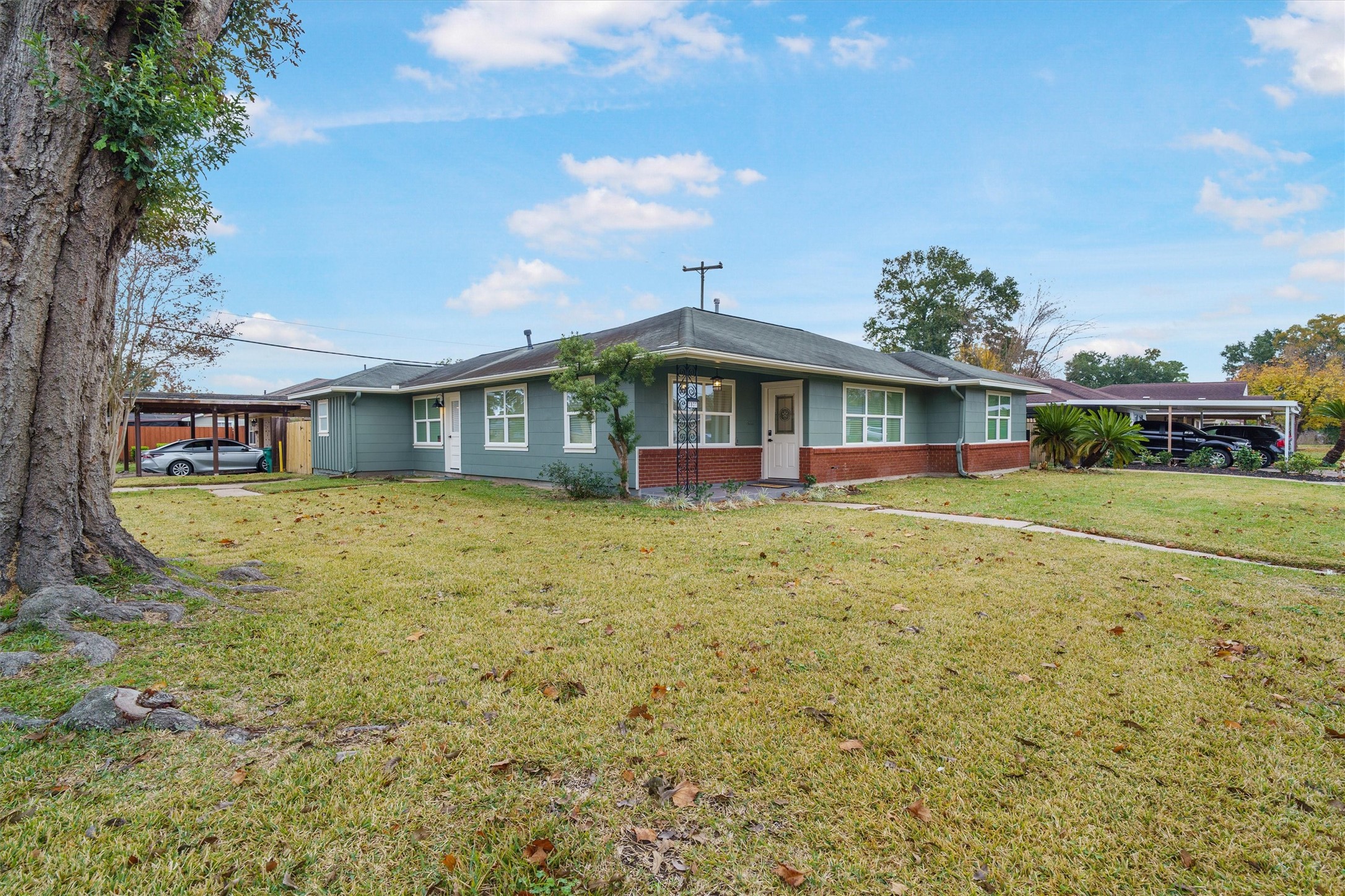 1801 Harding Street Pasadena, TX 77502 - Photo 2 of 22 a front view of a house with a yard
