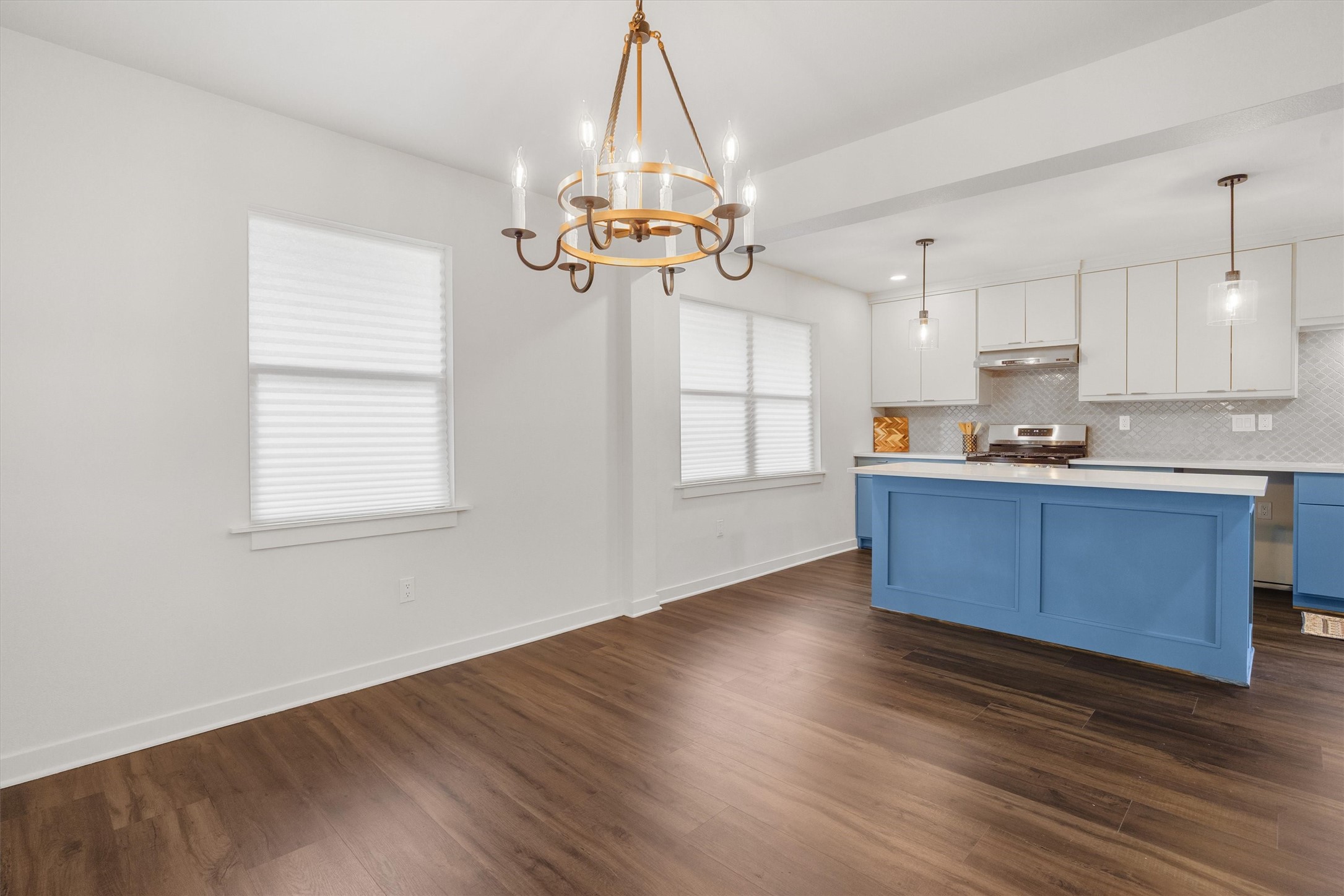 1801 Harding Street Pasadena, TX 77502 - Photo 9 of 22 a kitchen with stainless steel appliances granite countertop a sink cabinets wooden floor and a window