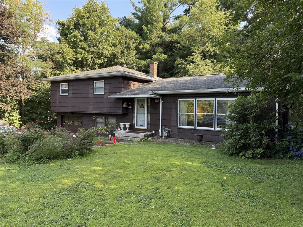 16 Meadowview Road Holyoke, MA 01040 - Photo 1 of 22 a view of a house with a yard porch and sitting area