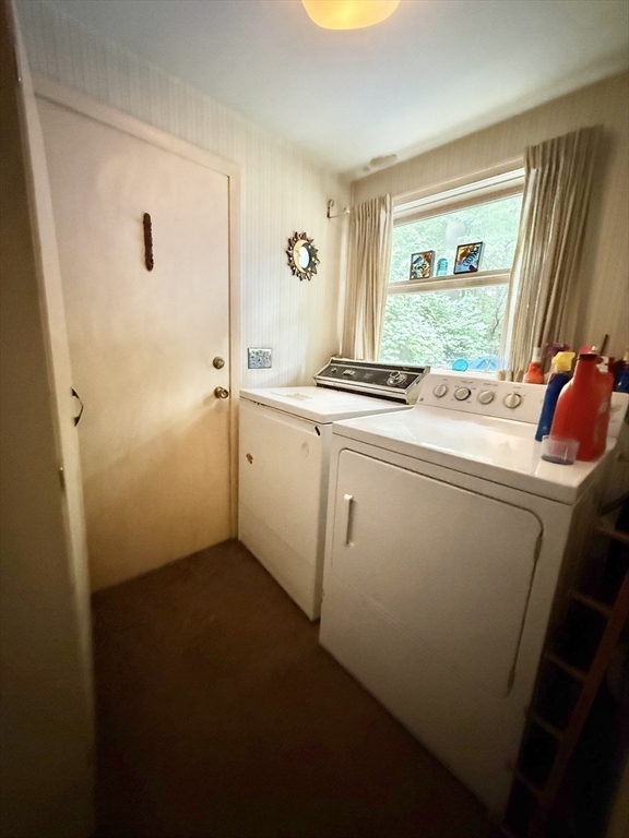 16 Meadowview Road Holyoke, MA 01040 - Photo 19 of 22 a view of washer and dryer with kitchen in the background