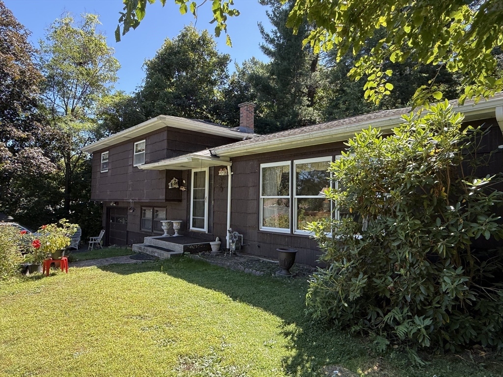 16 Meadowview Road Holyoke, MA 01040 - Photo 2 of 22 front view of house with a yard