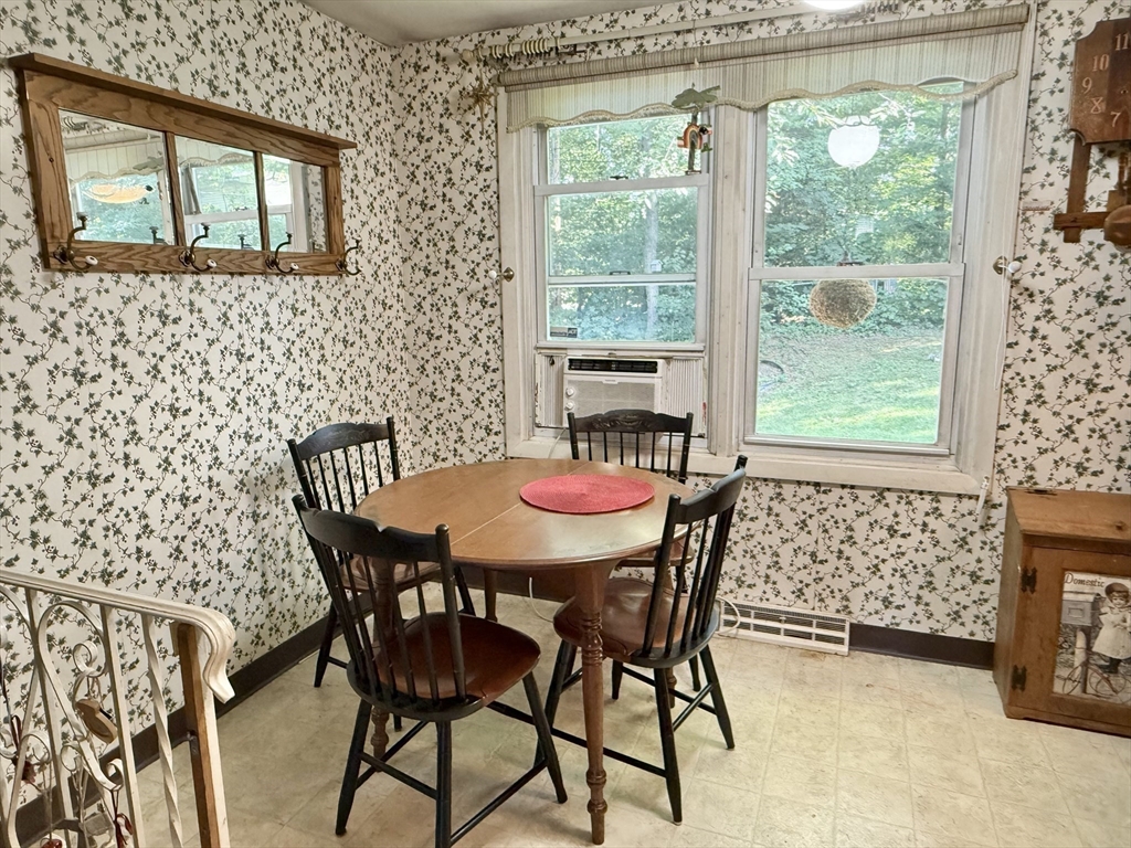 16 Meadowview Road Holyoke, MA 01040 - Photo 9 of 22 a view of a dining room with furniture and a window