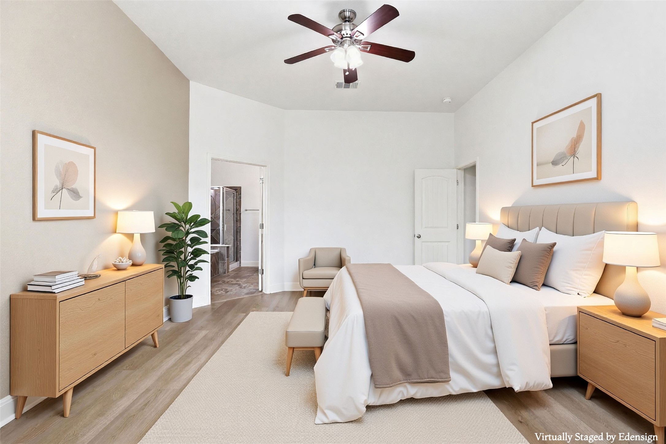152 Stone View Trail Austin, TX 78737 - Photo 18 of 33 Spacious bedroom featuring light-toned walls, wood-finish flooring, a ceiling fan with integrated lighting, and a doorway opening to an additional room