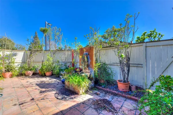 a garden view with a seating space