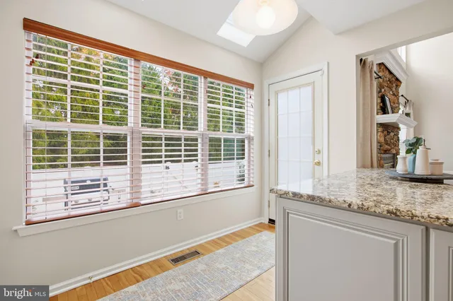 a view of a window and a kitchen