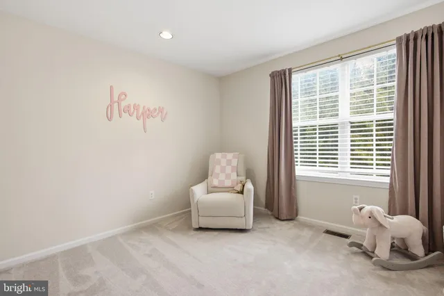 a room with a bed and a window