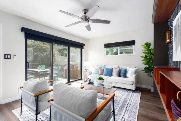 a workspace room with furniture and a window