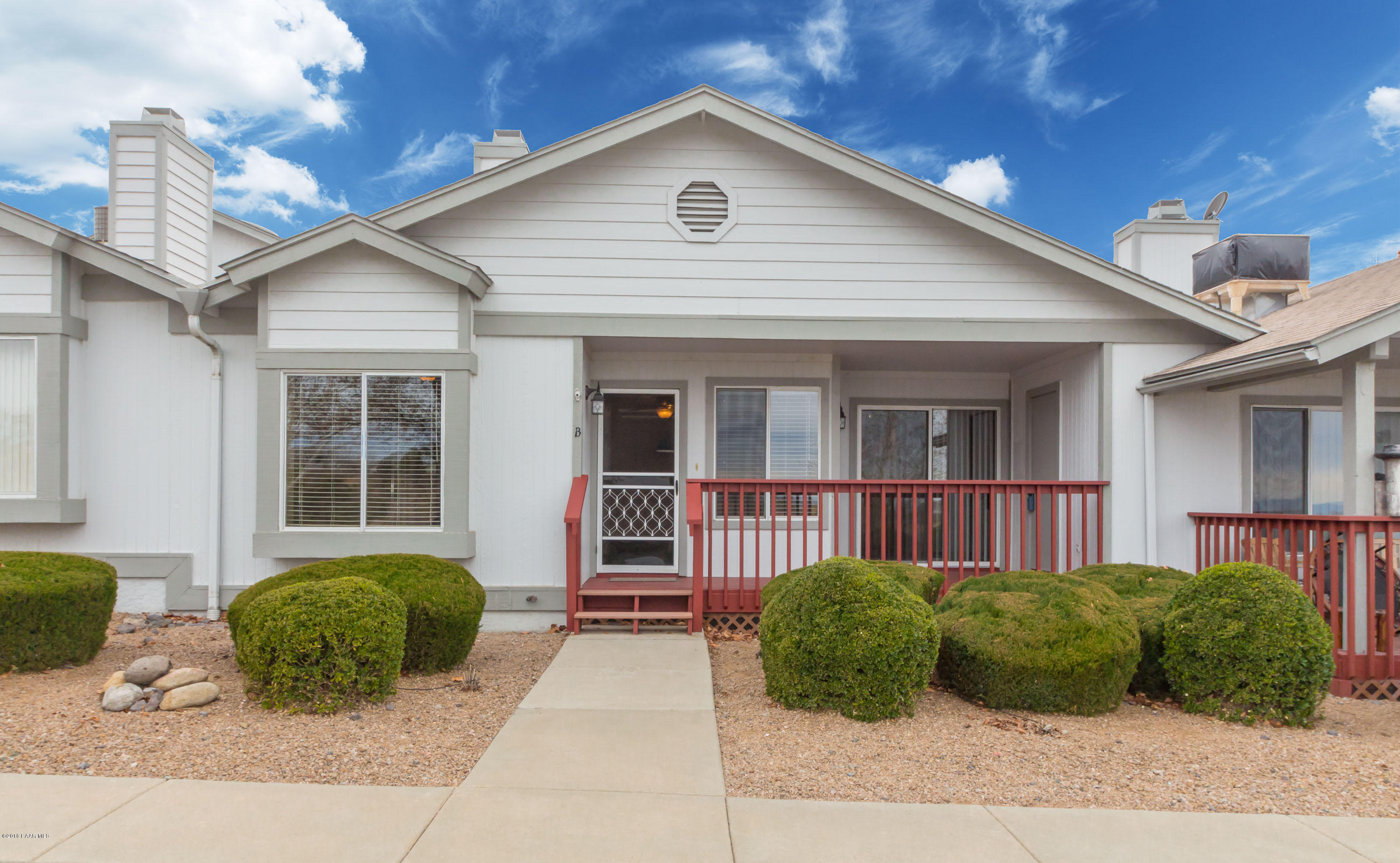3059 Smokey Road, Unit 21B Prescott, AZ 86301 - Photo 1 of 21 a view of a house with a garden