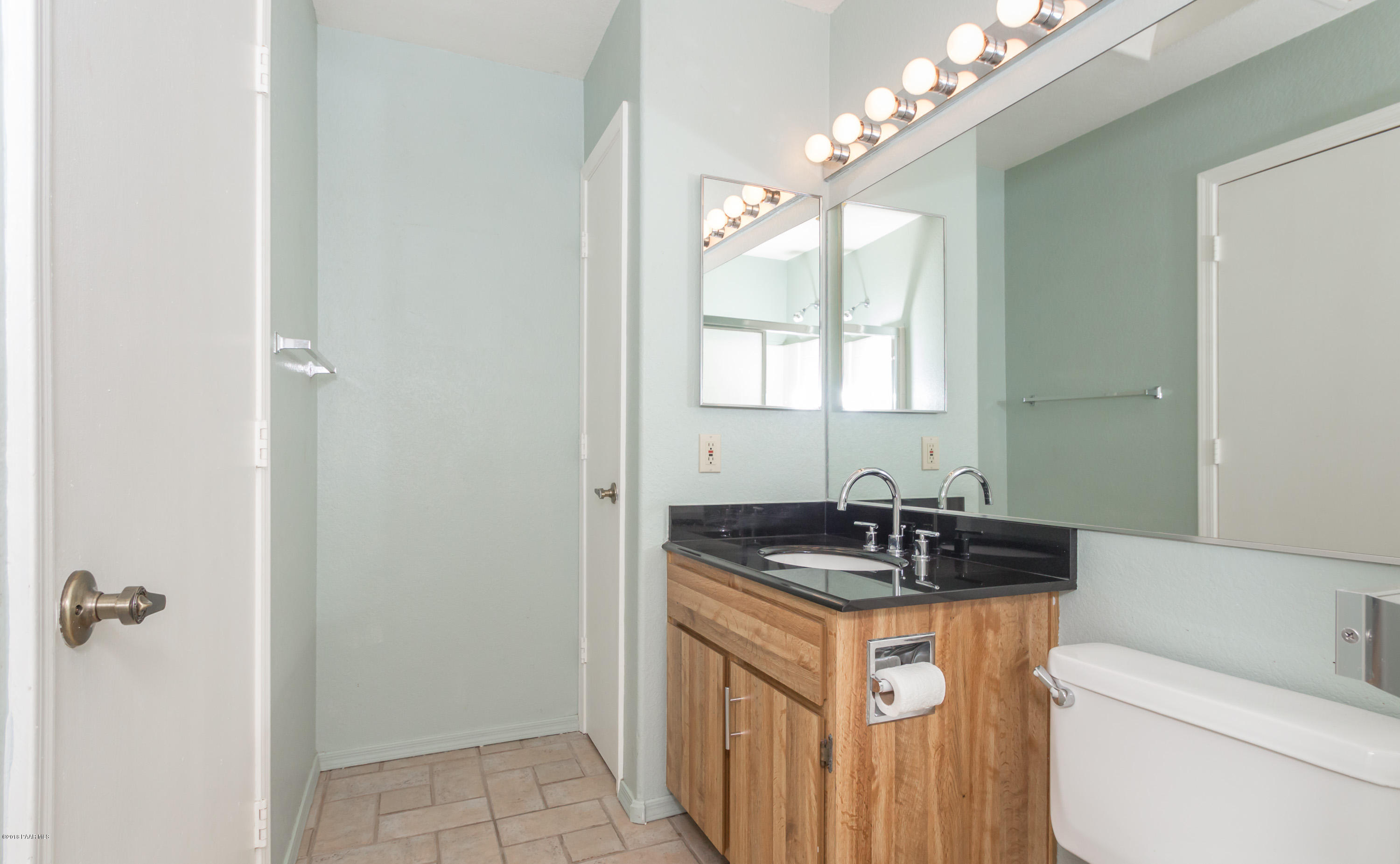 3059 Smokey Road, Unit 21B Prescott, AZ 86301 - Photo 13 of 21 a bathroom with a sink and a mirror