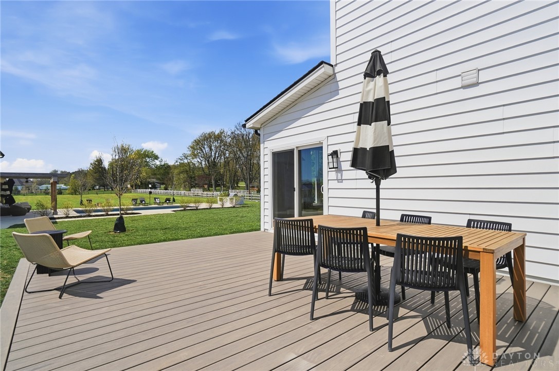 7823 Township Line Road Waynesville, OH 45068 - Photo 8 of 22 This spacious deck offers seamless indoor-outdoor living, perfect for alfresco dining.