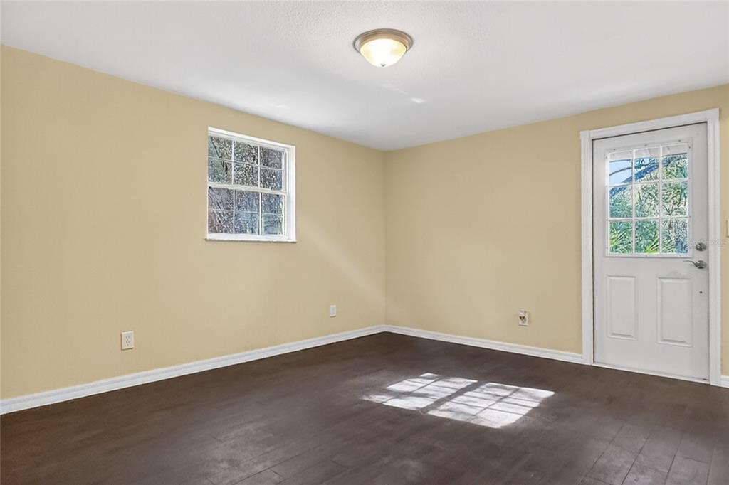 17220 Estes Road Lutz, FL 33548 - Photo 12 of 25 a view of an empty room with a window