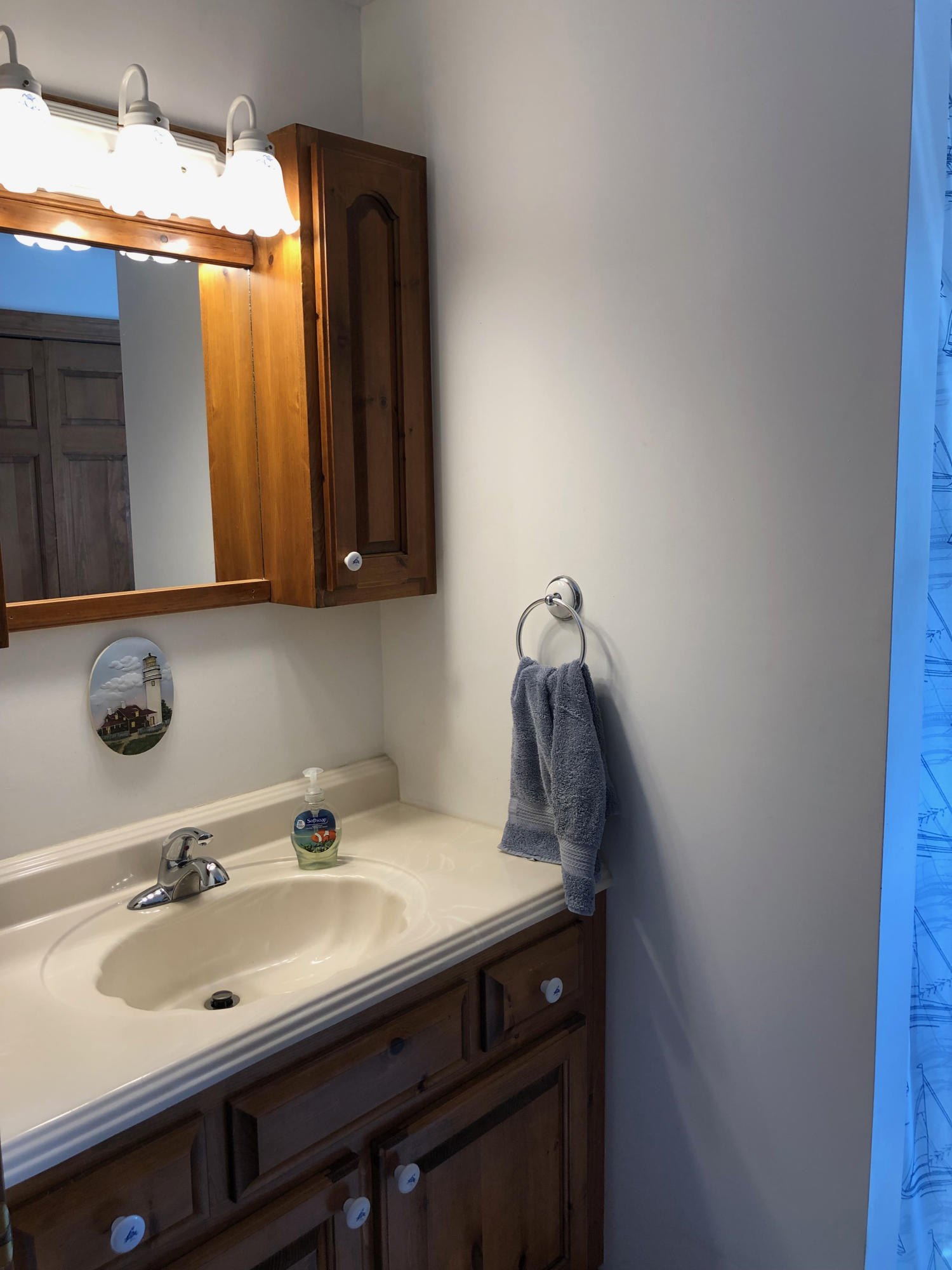 90 Jennie Clark Road Eastham, MA 02642 - Photo 12 of 35 a bathroom with a sink and a mirror