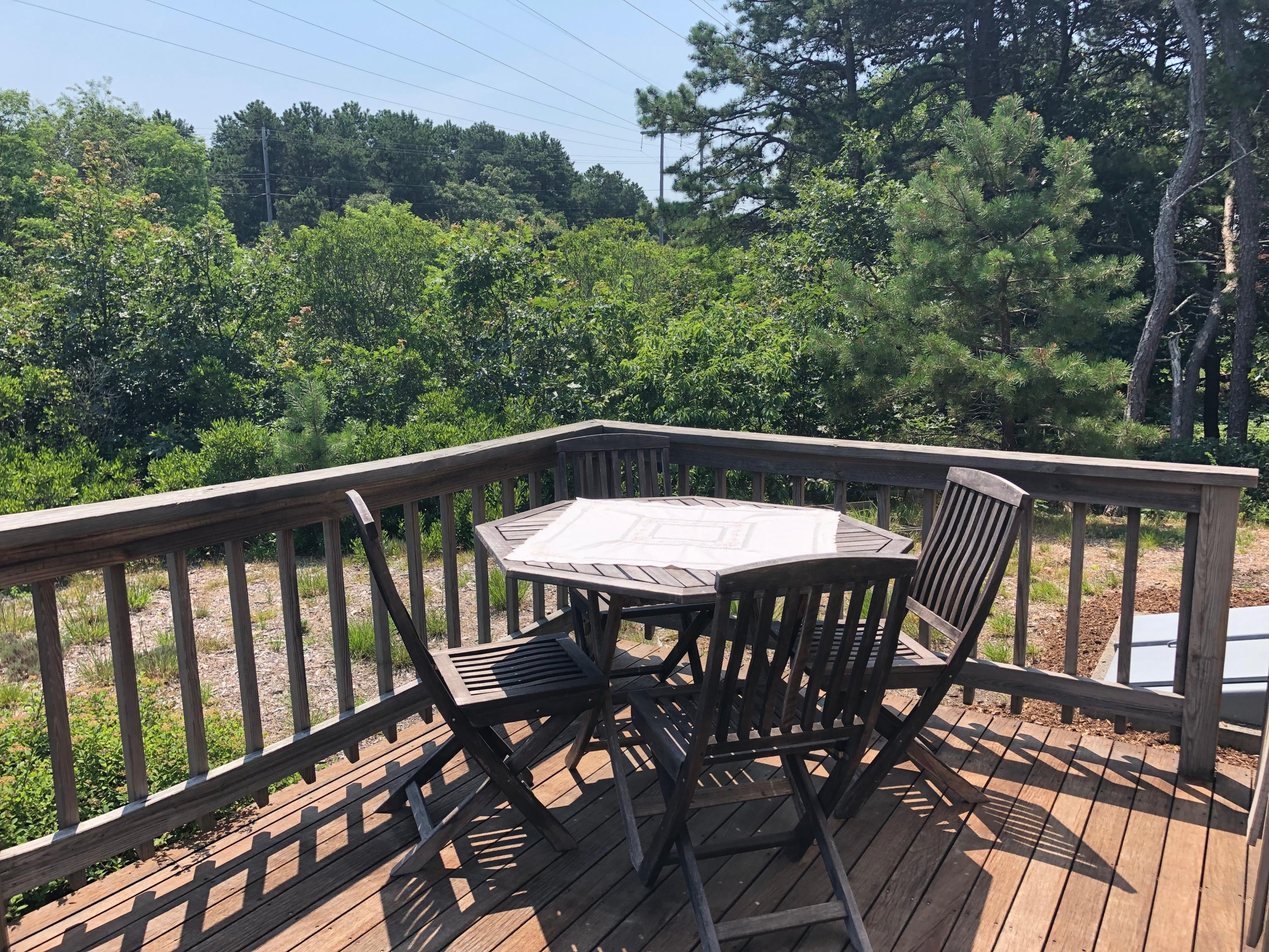 90 Jennie Clark Road Eastham, MA 02642 - Photo 16 of 35 a view of a balcony with furniture