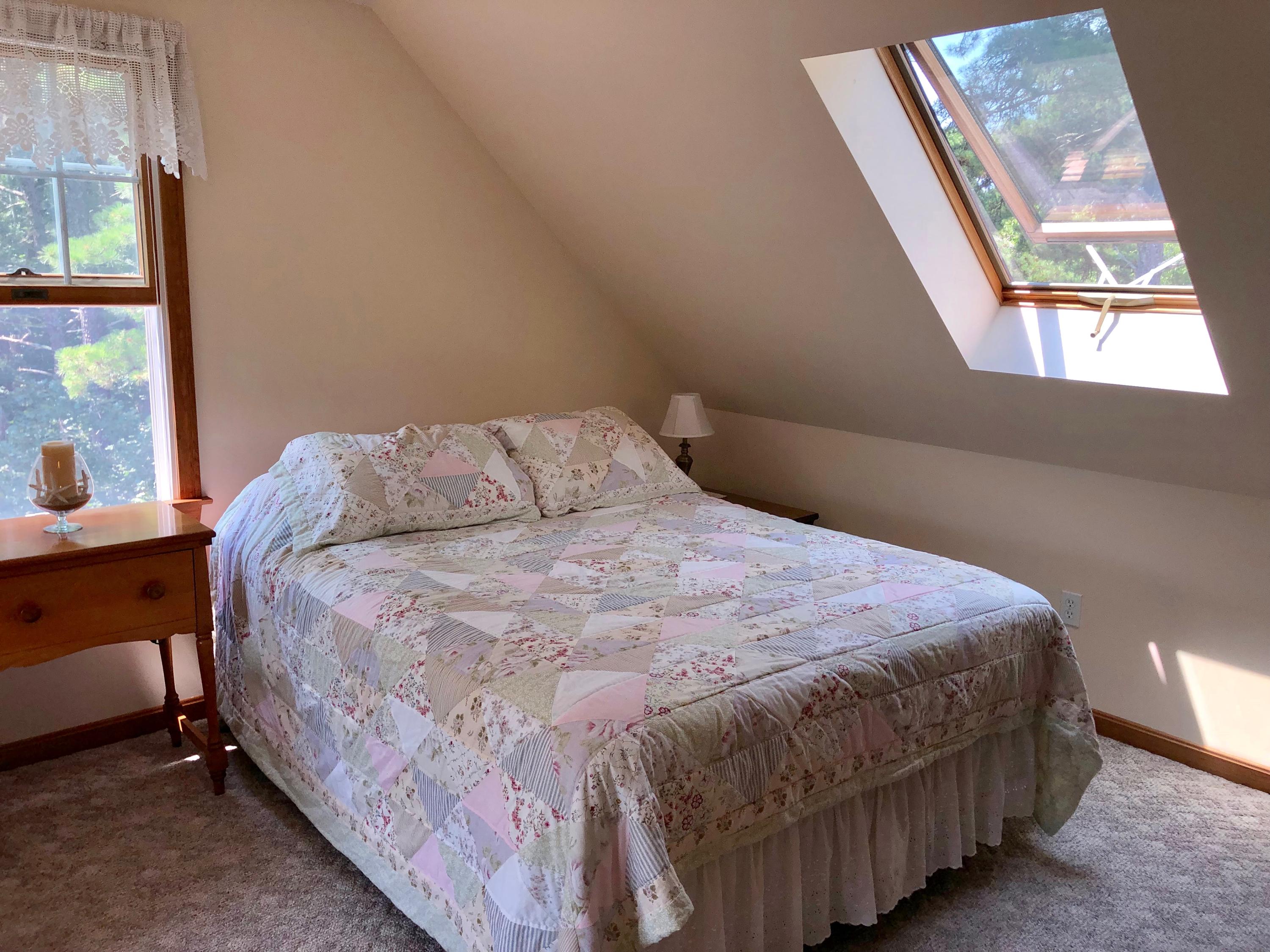 90 Jennie Clark Road Eastham, MA 02642 - Photo 18 of 35 a bedroom with a bed and a window