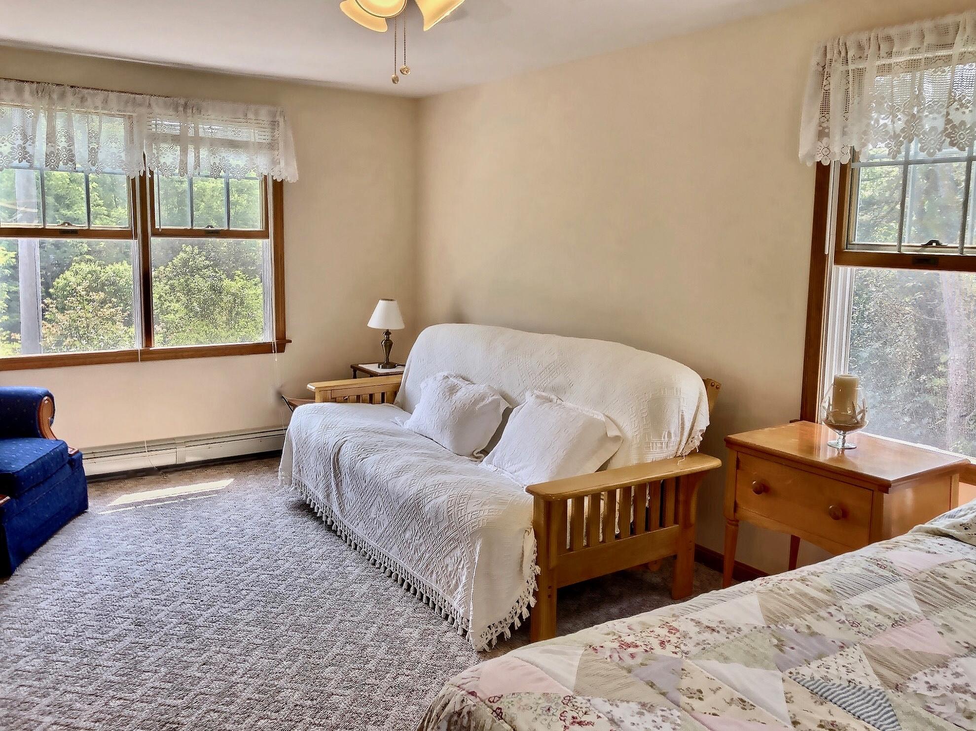 90 Jennie Clark Road Eastham, MA 02642 - Photo 19 of 35 a bedroom with a bed and a window