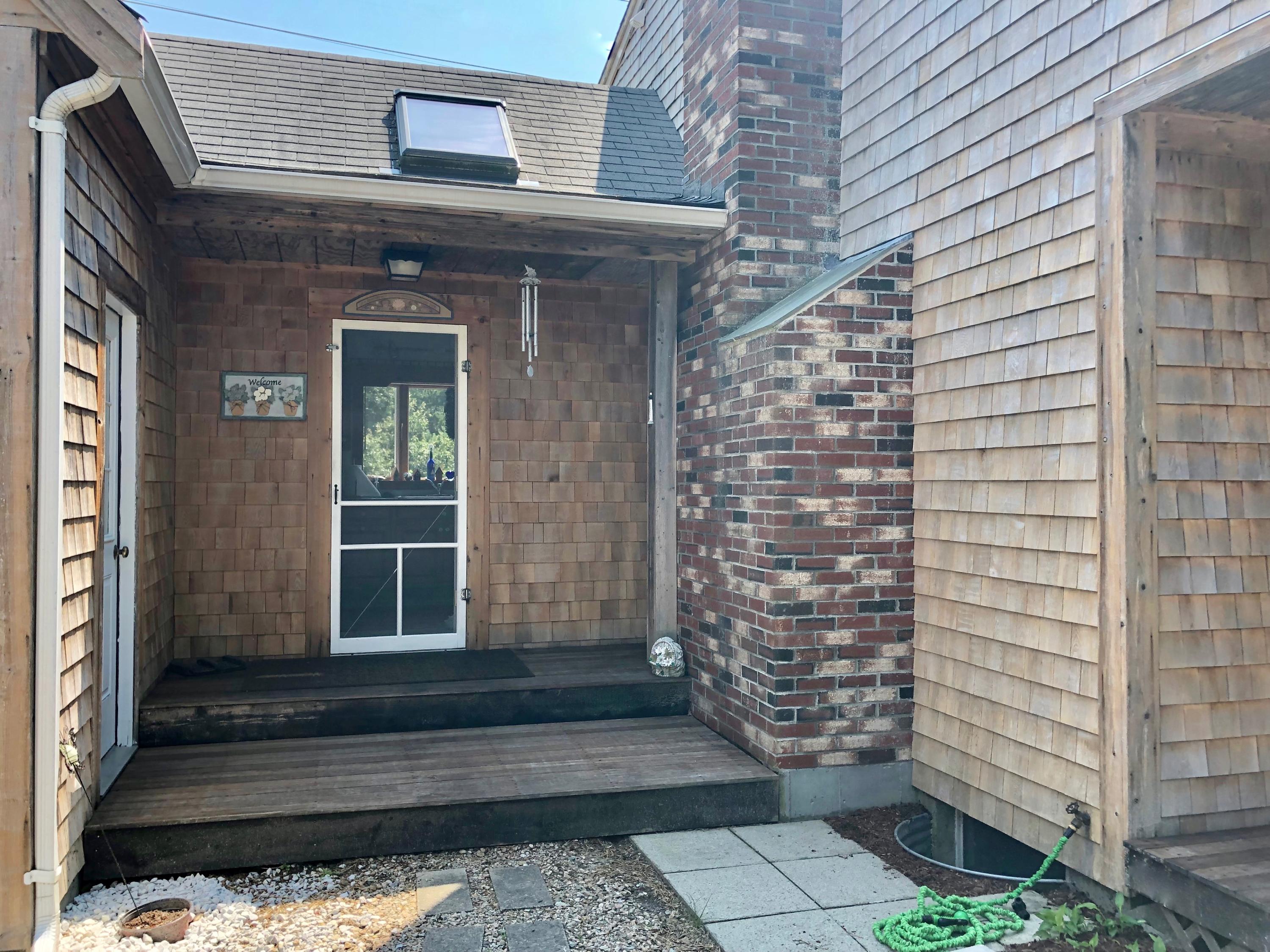 90 Jennie Clark Road Eastham, MA 02642 - Photo 2 of 35 a view of house with window and wooden floor