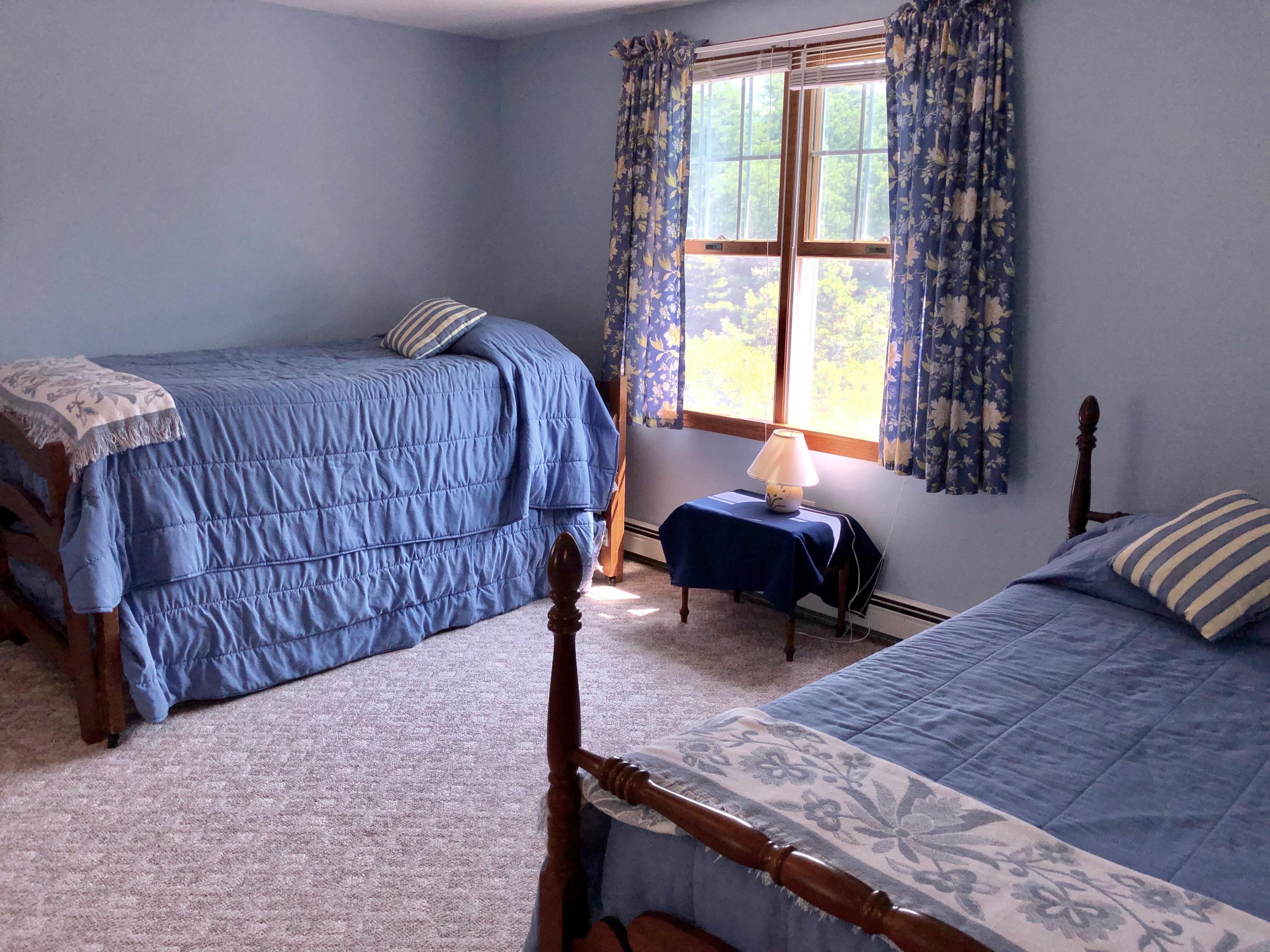 90 Jennie Clark Road Eastham, MA 02642 - Photo 22 of 35 a bedroom with a bed and window