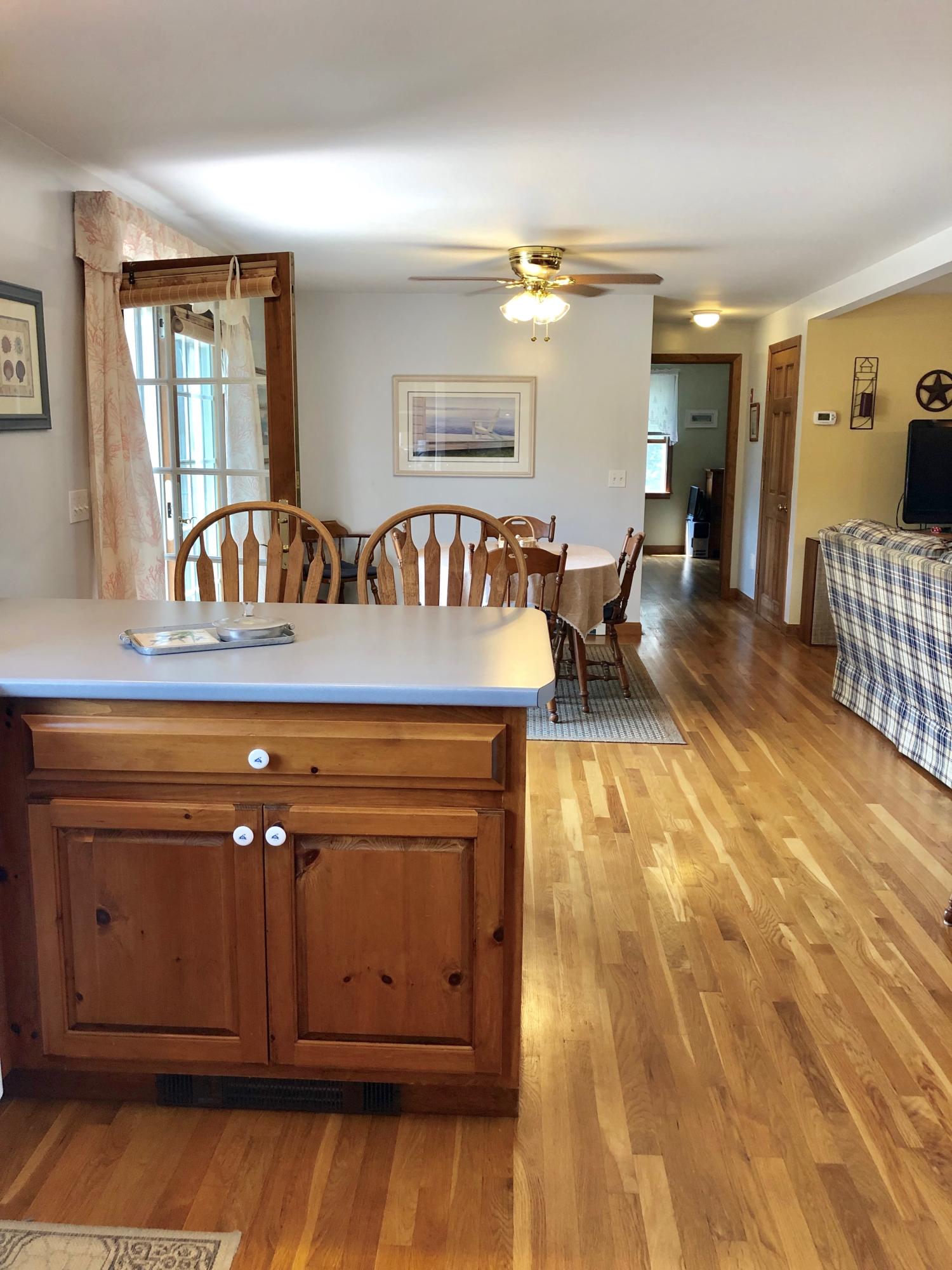 90 Jennie Clark Road Eastham, MA 02642 - Photo 24 of 35 a view of a living room and dining room