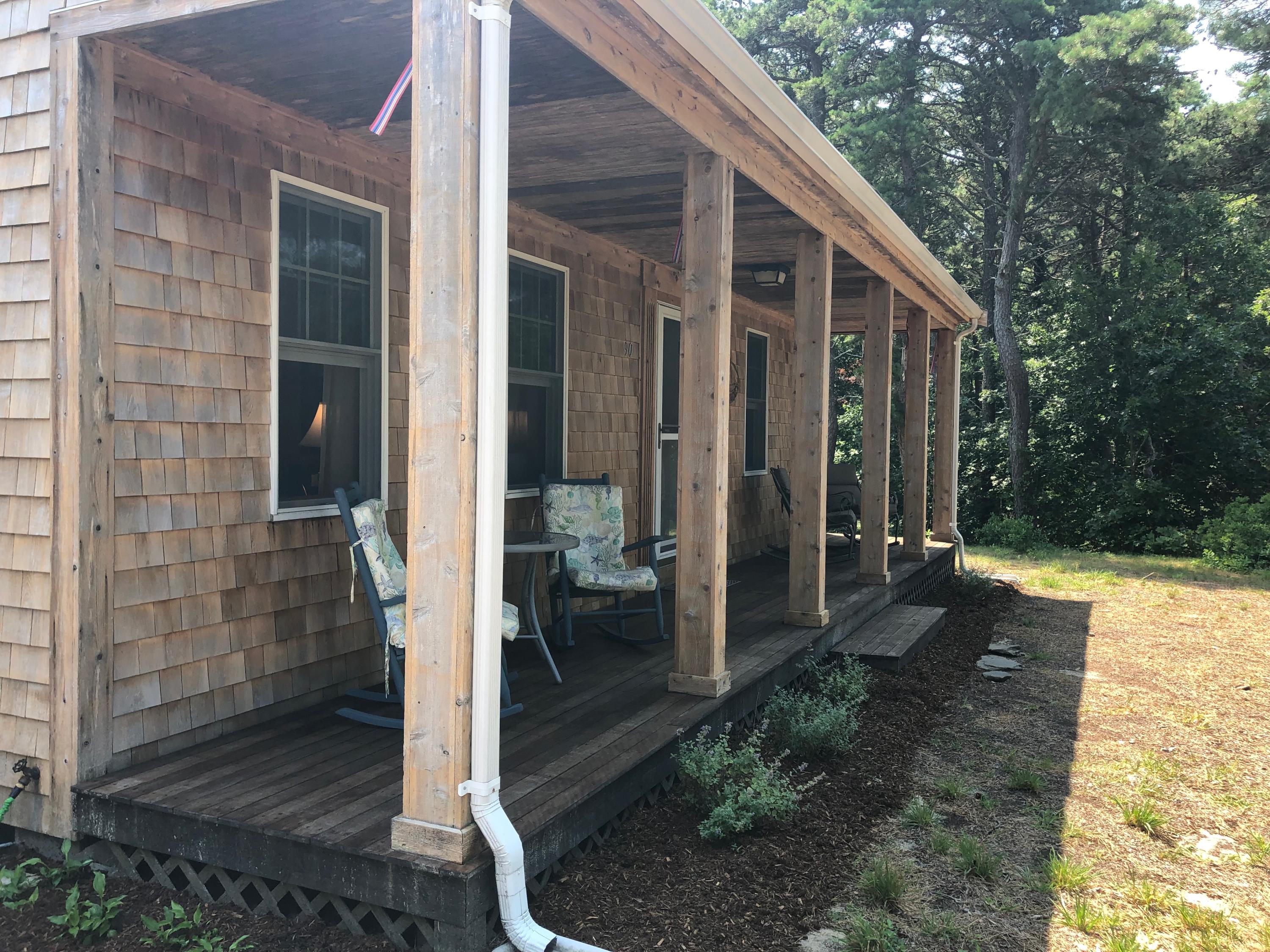 90 Jennie Clark Road Eastham, MA 02642 - Photo 29 of 35 a view of small house with backyard
