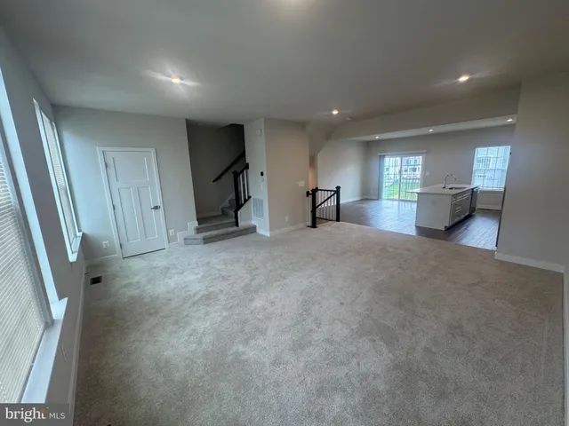 a view of a livingroom with a staircase