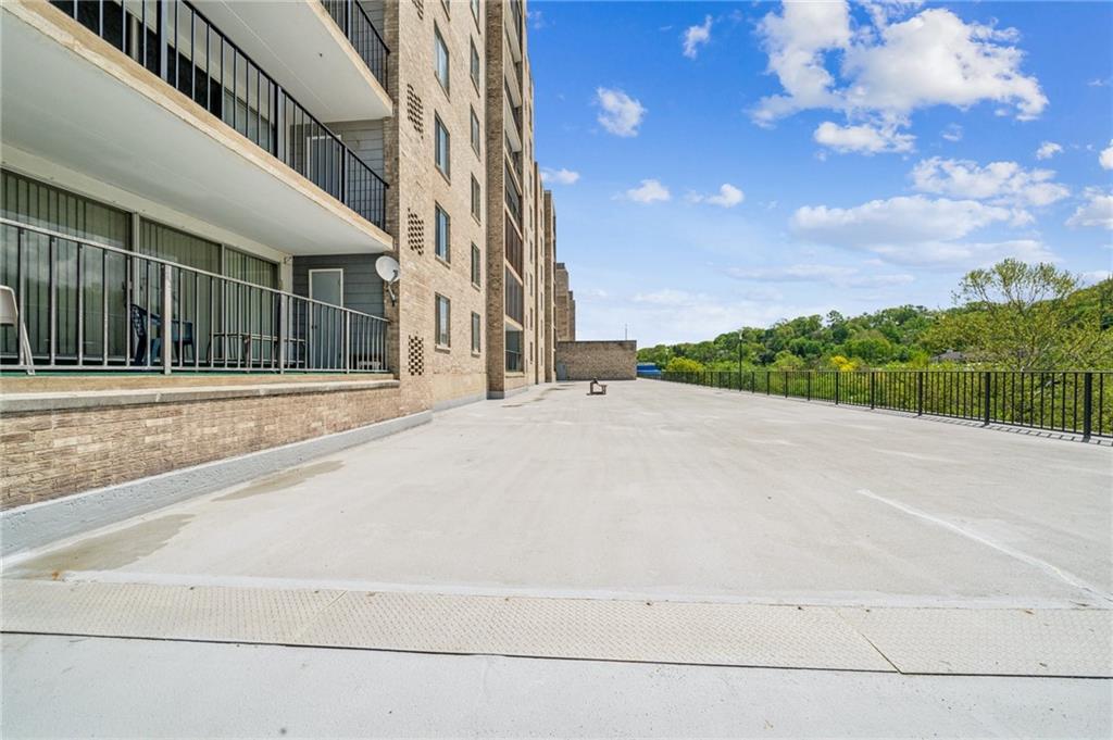 2160 Greentree Road, Unit 100W Pittsburgh, PA 15220 - Photo 22 of 26 pool doors open to large deck perfect to socialize.