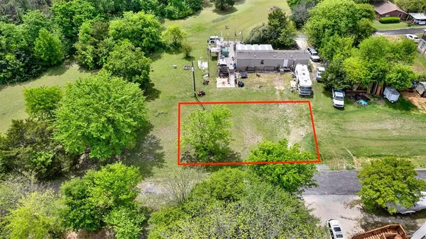 an aerial view of residential house with outdoor space