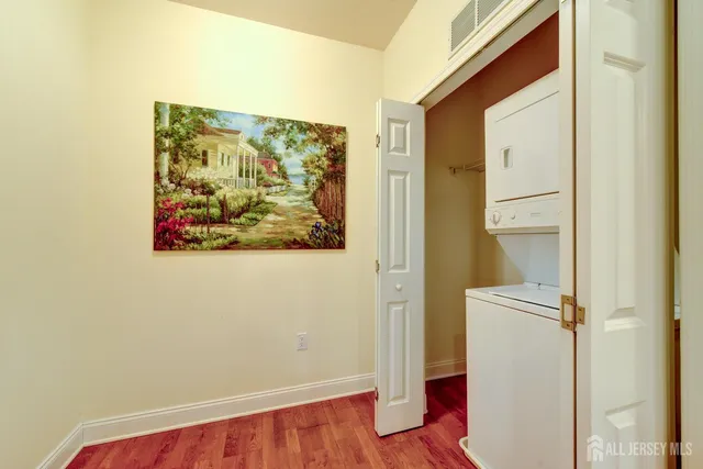 a view of front door with wooden floor