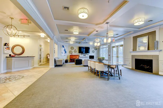 a view of a livingroom with furniture and a fireplace