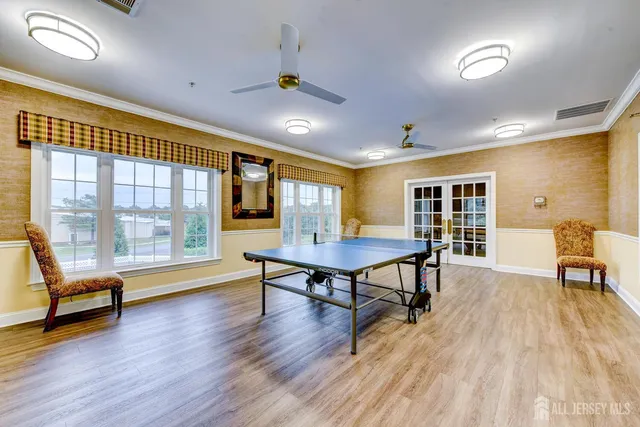 a kitchen with a refrigerator and a sink