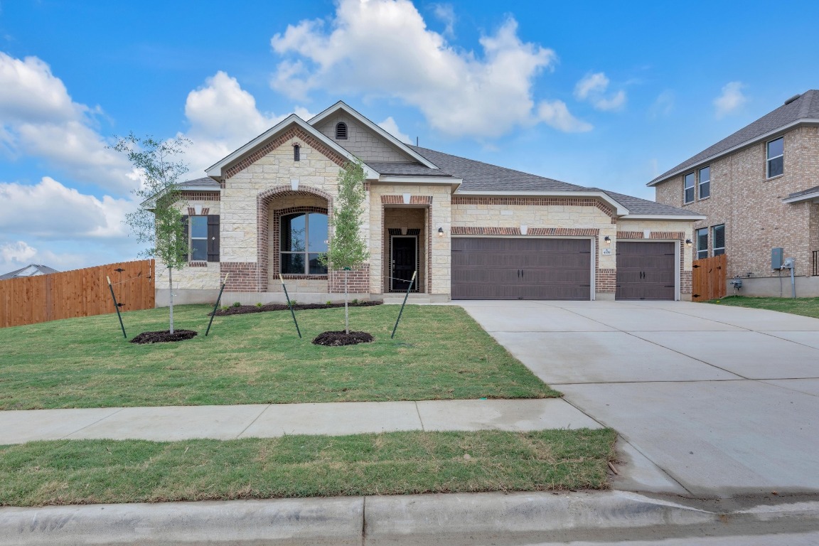 4859 Padula Drive Round Rock, TX 78665 - Photo 1 of 1 a front view of a house with a yard and garage