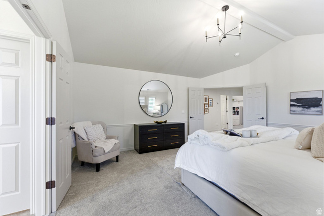 1712 Somerset Ridge Drive Draper, UT 84020 - Photo 34 of 76 Spacious bedroom featuring vaulted ceilings, light gray carpeting, and white paneled doors