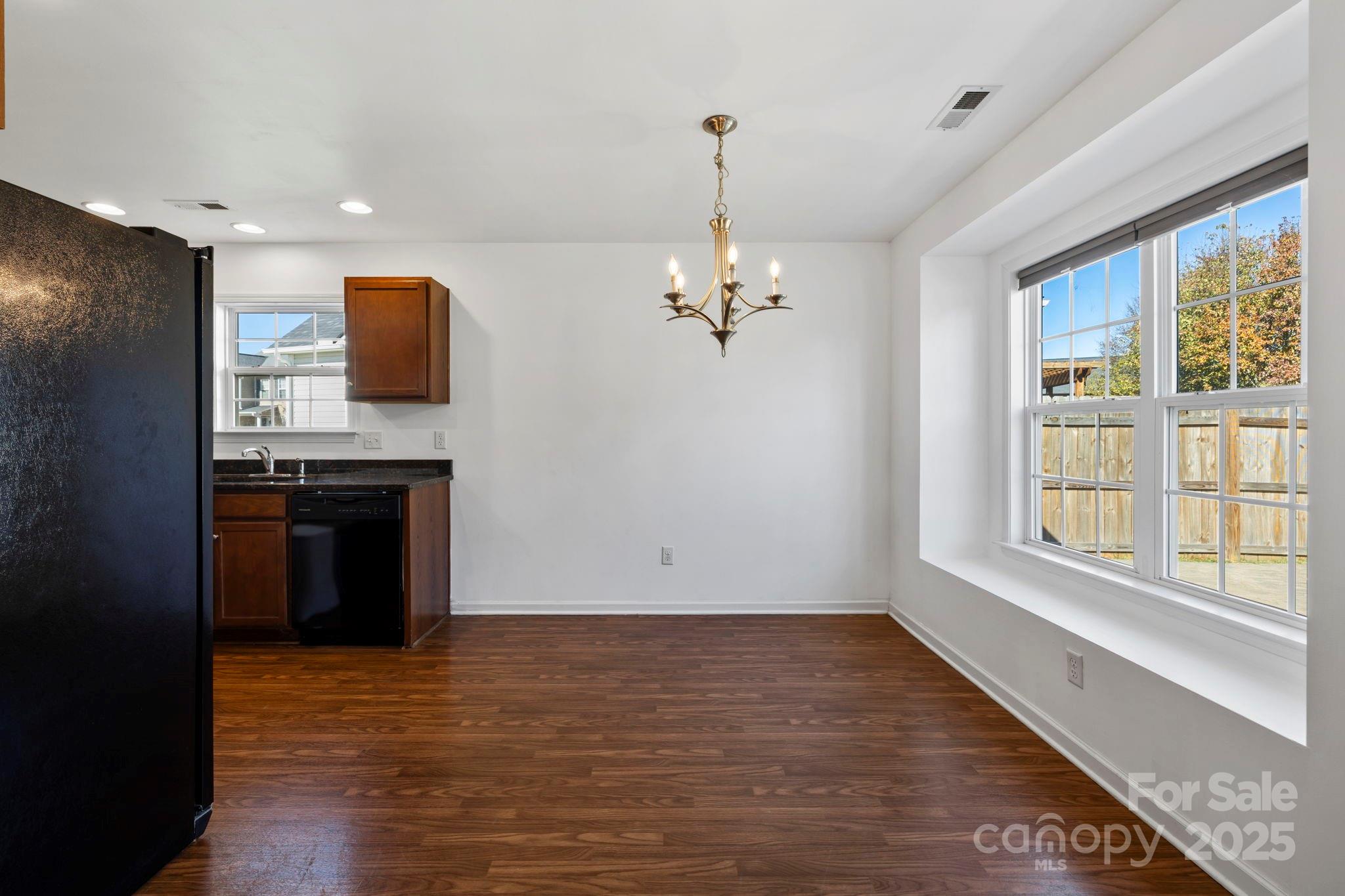 284 Mud Creek Road Fletcher, NC 28732 - Photo 12 of 31 a view of kitchen with stove and refrigerator