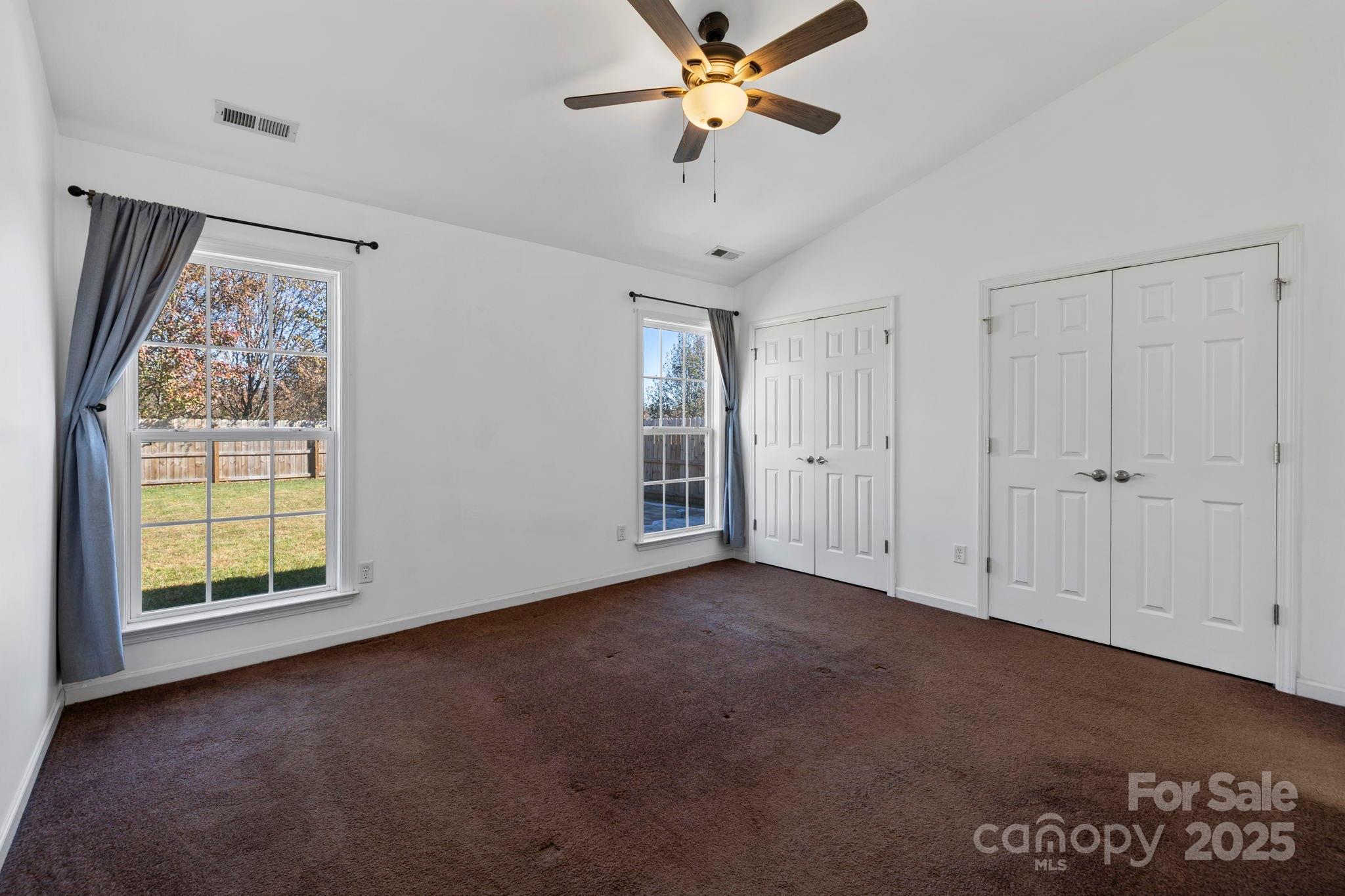 284 Mud Creek Road Fletcher, NC 28732 - Photo 18 of 36 a view of an empty room with a window