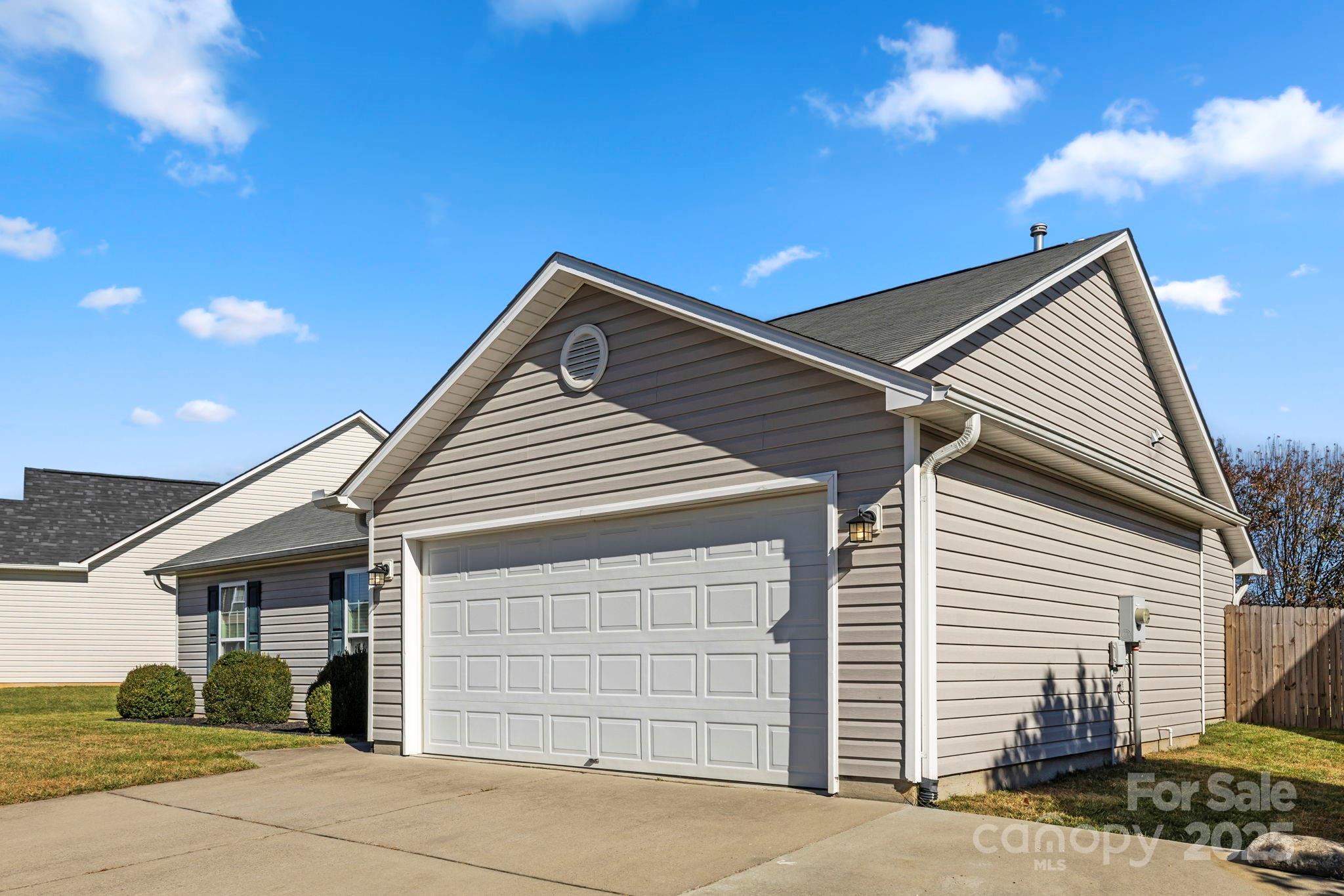 284 Mud Creek Road Fletcher, NC 28732 - Photo 2 of 31 a front view of a house with a yard