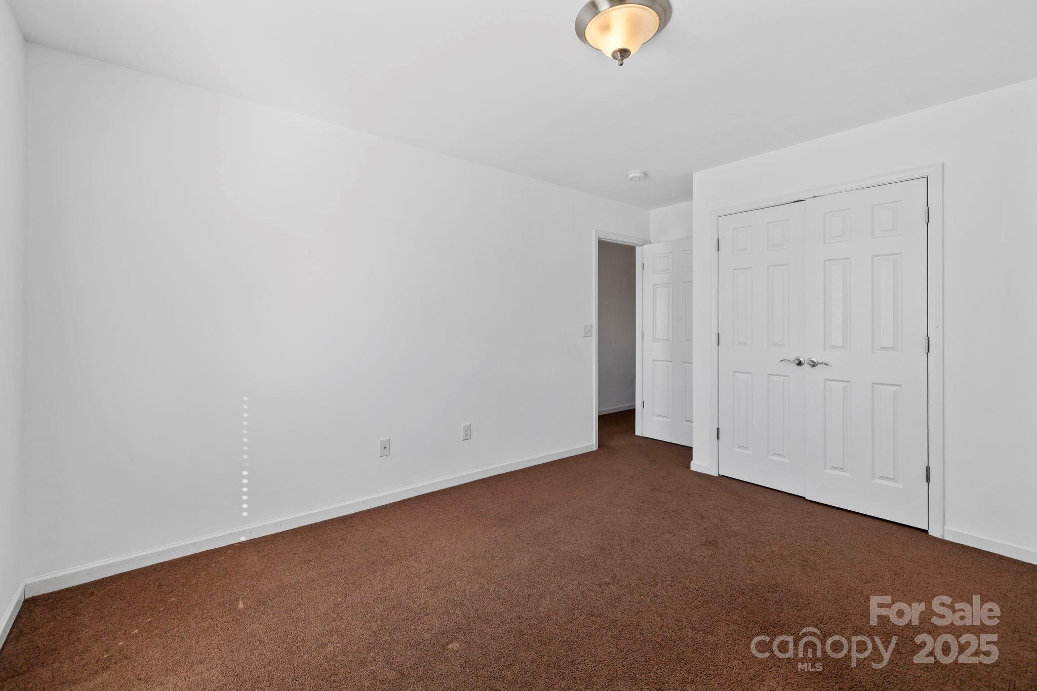 284 Mud Creek Road Fletcher, NC 28732 - Photo 22 of 36 a view of an empty room