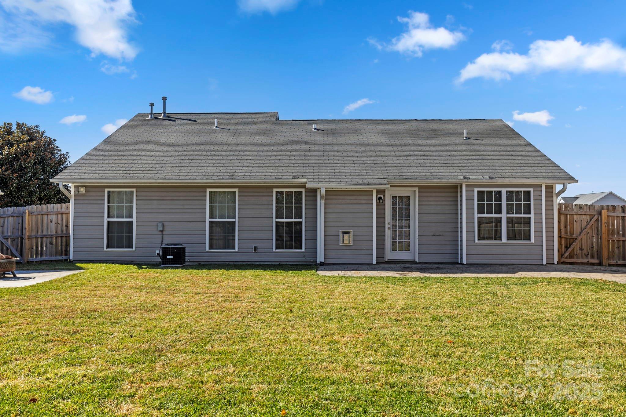 284 Mud Creek Road Fletcher, NC 28732 - Photo 25 of 31 a house view with a sitting space and garden