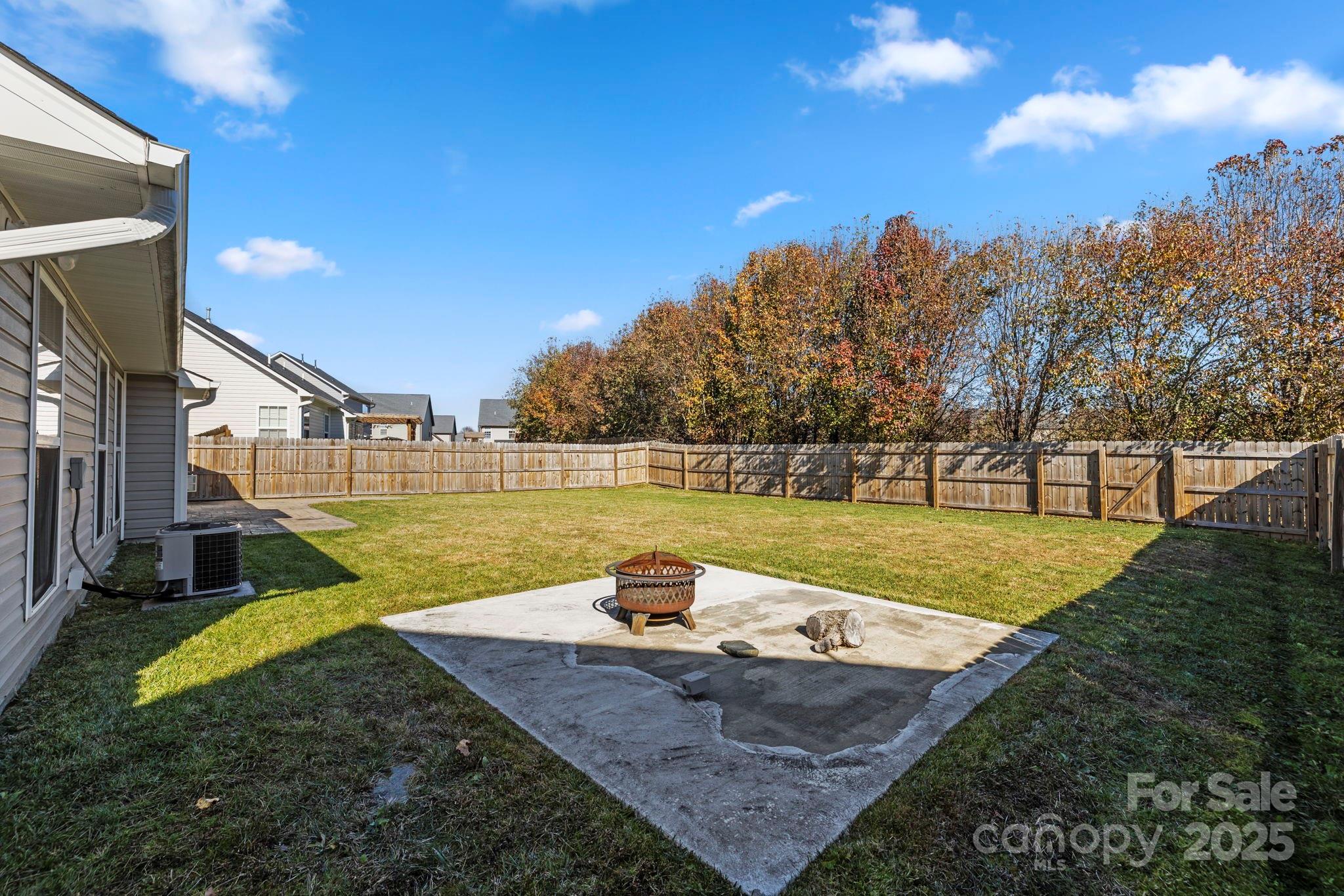 284 Mud Creek Road Fletcher, NC 28732 - Photo 27 of 36 a view of a house with swimming pool and a yard