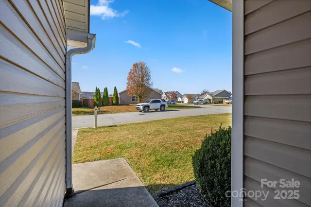 a view of a balcony with an outdoor space