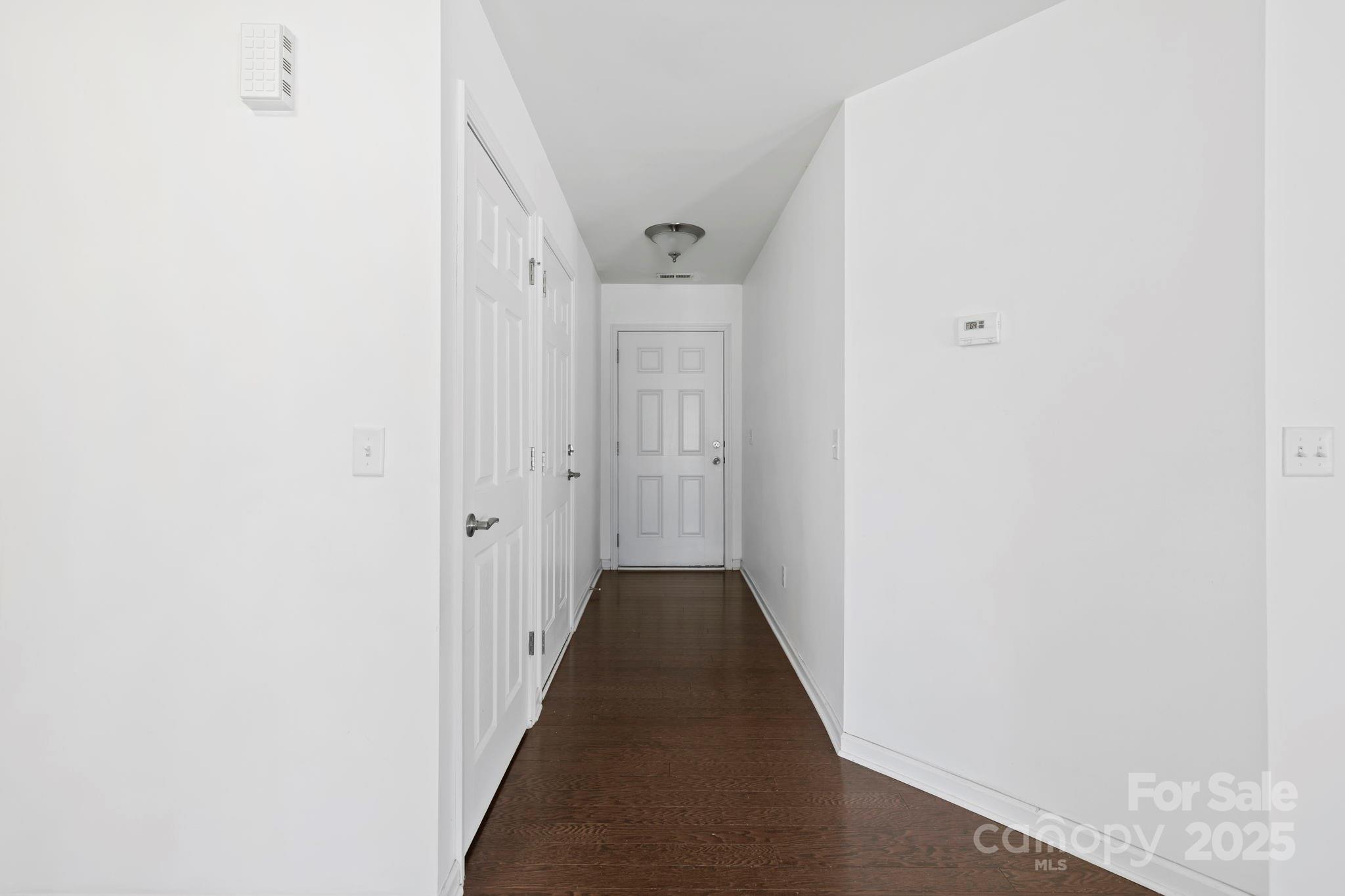 284 Mud Creek Road Fletcher, NC 28732 - Photo 6 of 31 a view of a hallway with white walls