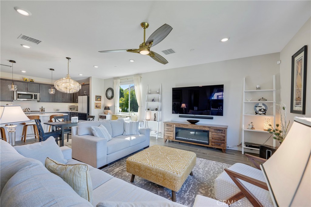 79244 Zamora Court Indio, CA 92203 - Photo 18 of 52 a living room with furniture and a flat screen tv
