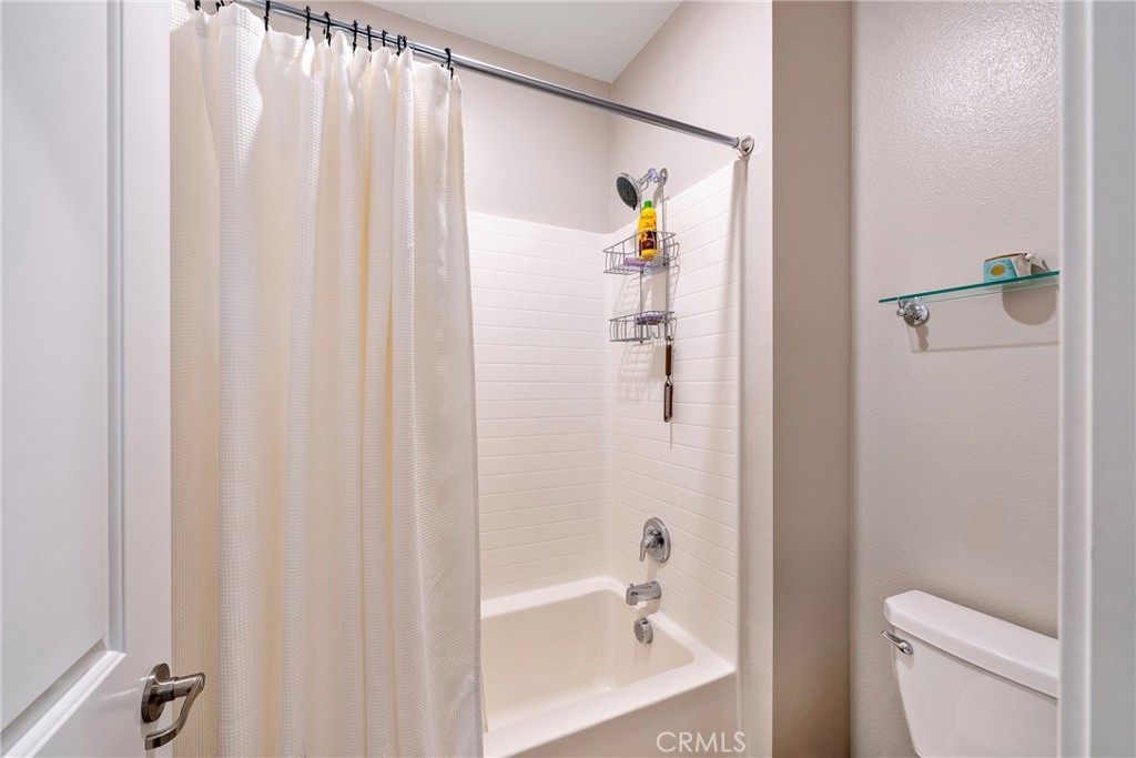 79244 Zamora Court Indio, CA 92203 - Photo 39 of 52 a bathroom with a shower and a toilet