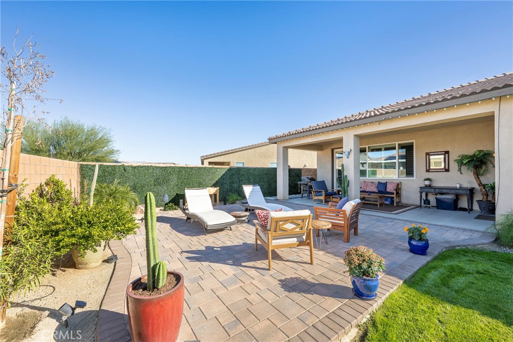 79244 Zamora Court Indio, CA 92203 - Photo 47 of 52 a outdoor space with furniture and garden view