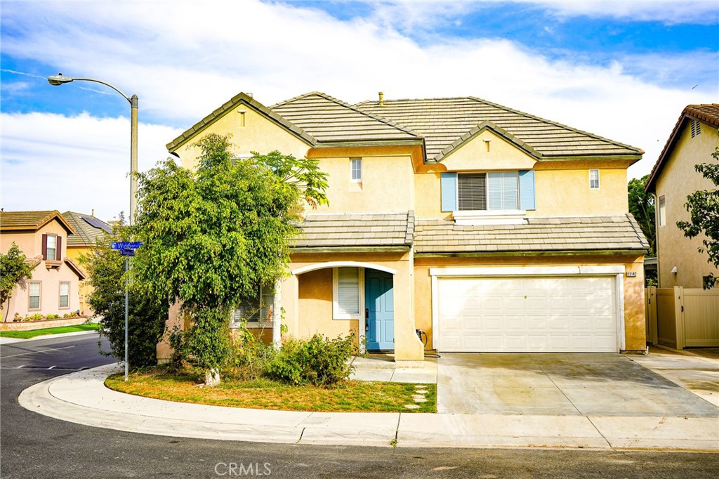 13142 Windsor Lane Garden Grove, CA 92843 - Photo 1 of 24 a front view of a house with a yard