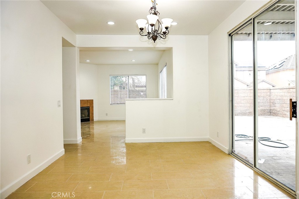 13142 Windsor Lane Garden Grove, CA 92843 - Photo 11 of 24 a view of a livingroom with a chandelier