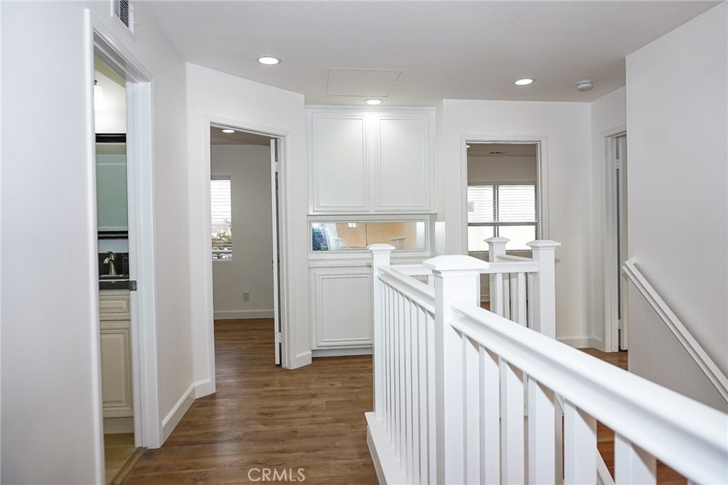 13142 Windsor Lane Garden Grove, CA 92843 - Photo 18 of 24 a view of a kitchen with a sink and refrigerator