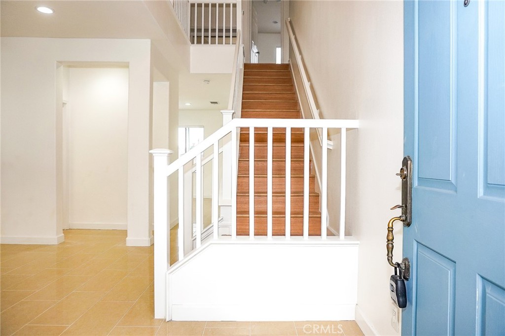 13142 Windsor Lane Garden Grove, CA 92843 - Photo 2 of 24 a view of an entryway with wooden floor
