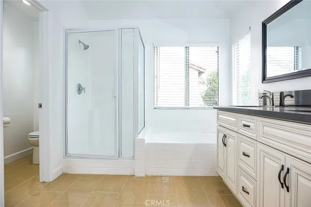 a bathroom with a bathtub and a sink
