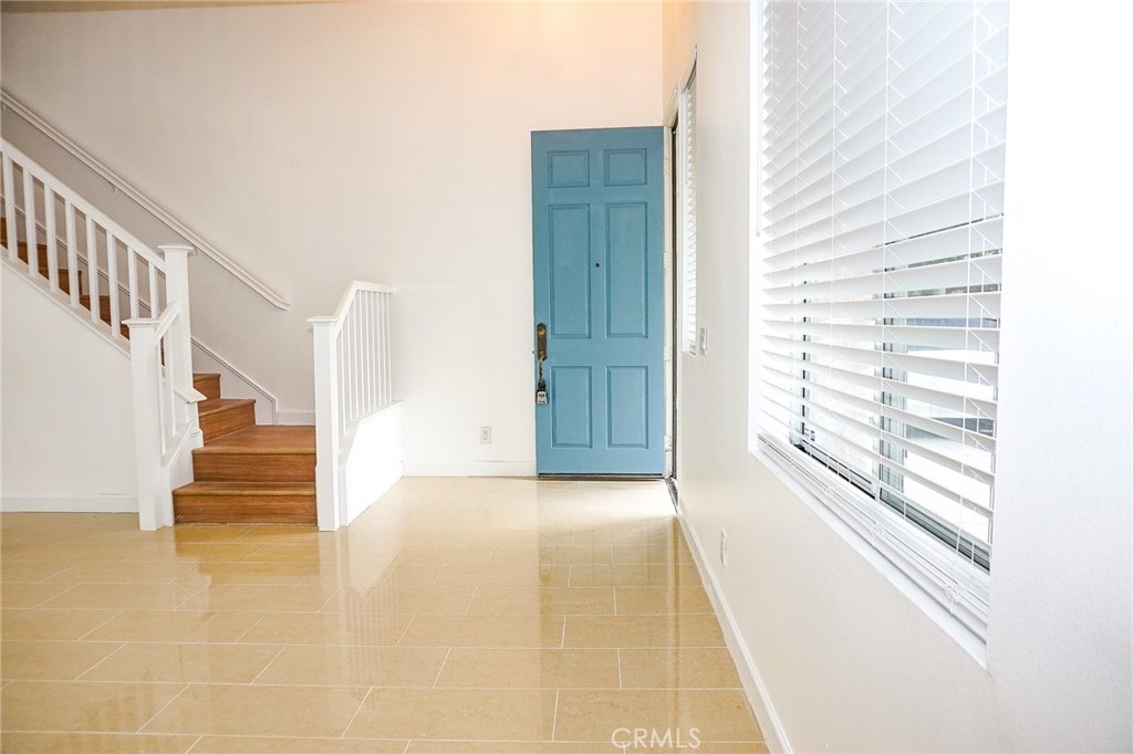 13142 Windsor Lane Garden Grove, CA 92843 - Photo 4 of 24 a view of entryway and hall with wooden floor