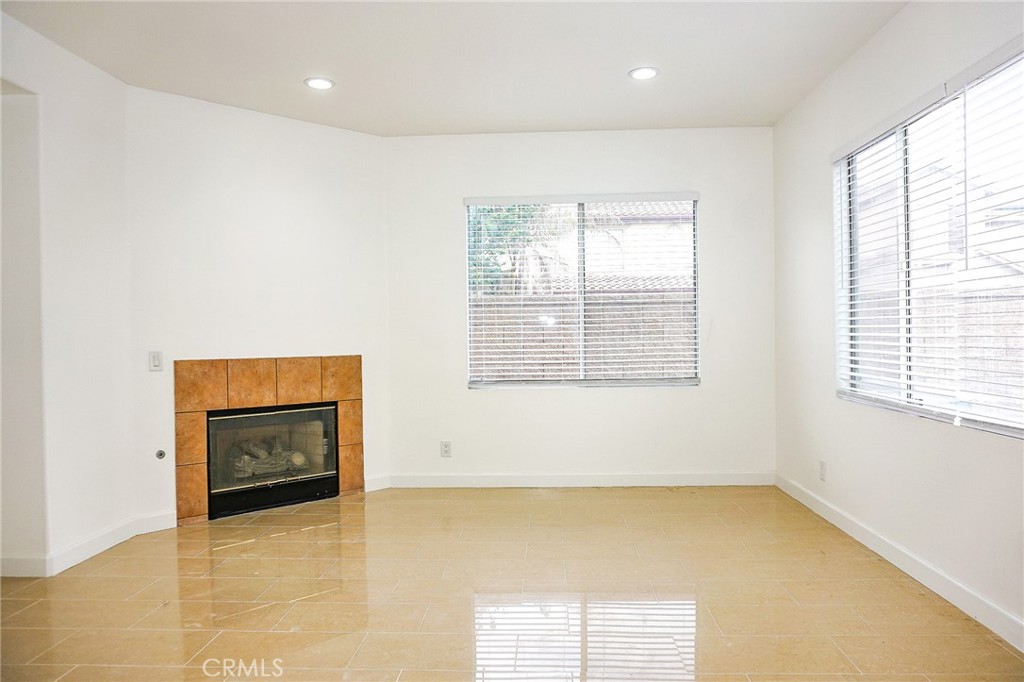 13142 Windsor Lane Garden Grove, CA 92843 - Photo 9 of 24 a view of an empty room with a window